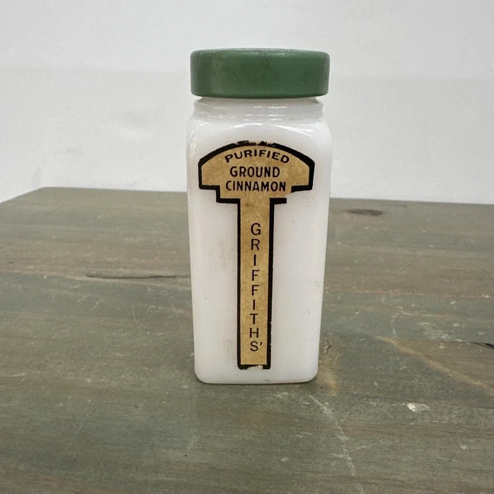 Vintage Griffith's Cinnamon 3/4 oz spice bottle White Milkglass jar Green lid